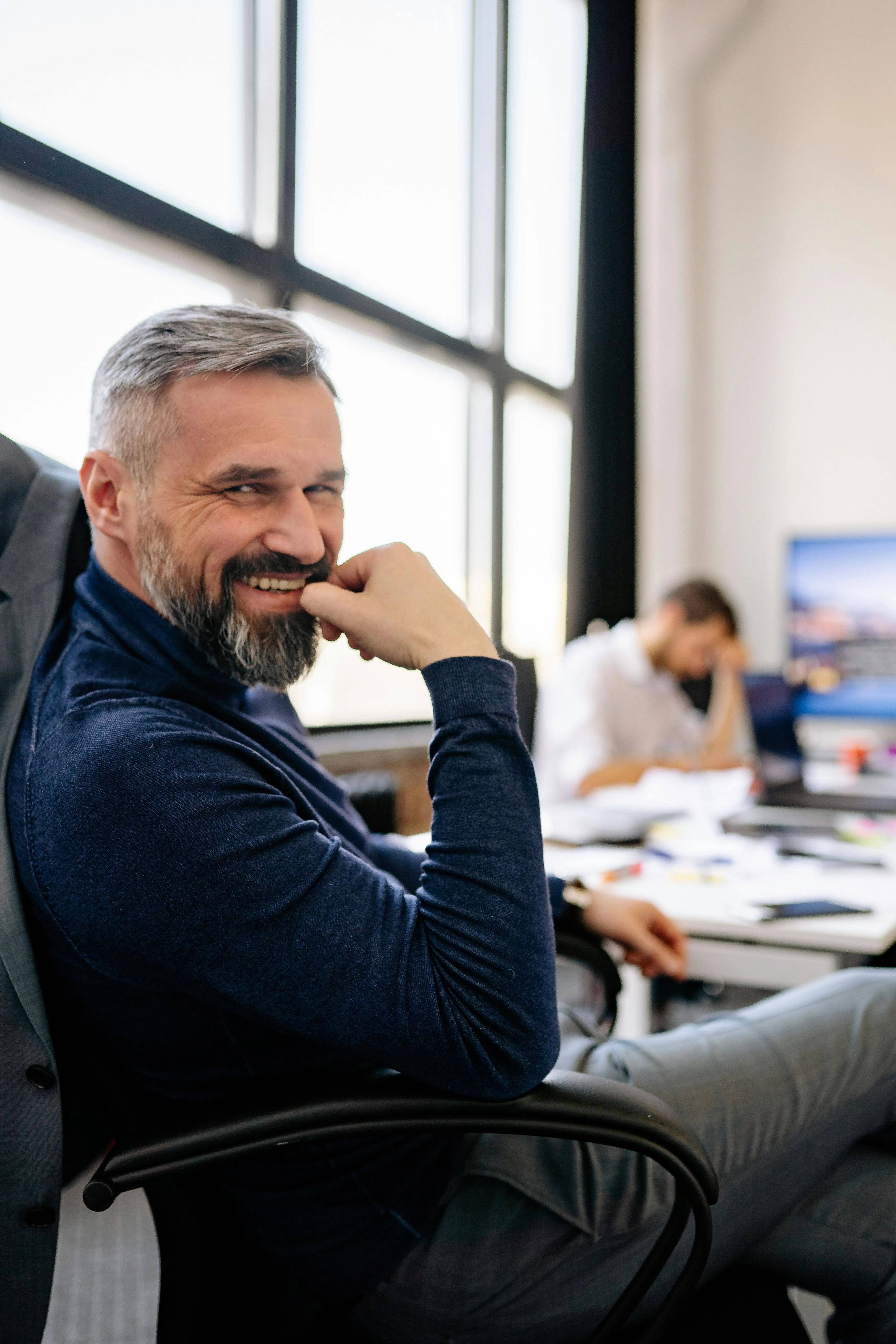 happy man web designer working in an office